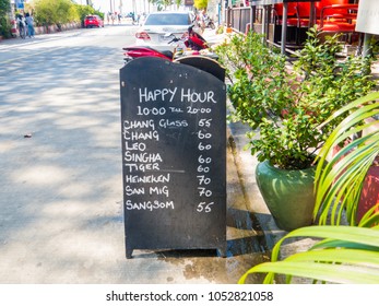 PATTAYA, THAILAND, JANUARY 31, 2018: Happy Hour Menu Outside A Bar On Thappraya Road In Jomtien. 