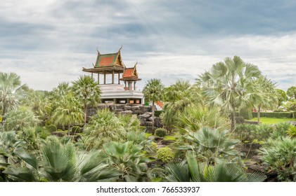 Pattaya, Thailand - Nov 25, 2017  Pagoda in beautiful garden with light beam from sky at Nong Nooch Garden - Shutterstock ID 766533937
