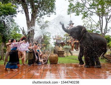 PATTAYA, THAILAND - September 14, 2019 : Asian Diversity People playing, splashing water with elephant during traditional Songkran festival showing in Pattaya ,THAI ARTS AND CULTURE VILLAGE,Thailand
