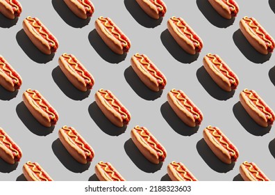 Patter of fresh made hot dogs on gray  background