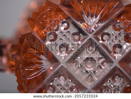The pattern of 1930's, pink depression glass. 