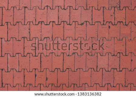 The pattern of the area covered with terracotta bricks arranged in layers with equal degrees alternately Giving natural and comfortable look when walking through. 