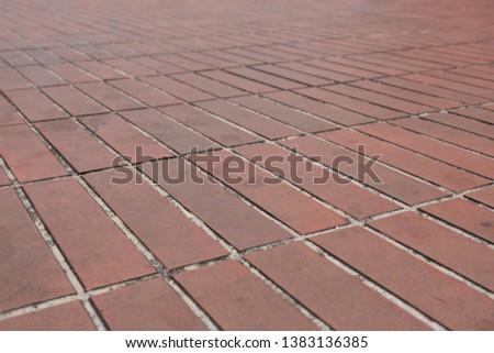 The pattern of the area covered with terracotta bricks arranged in layers with equal degrees alternately Giving natural and comfortable look when walking through. 
