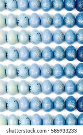 Pattern background  with  blue and turquoise speckled easter eggs.  Ester concept
