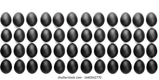 Pattern of black easter eggs on white background. Easter minimalistic concept - Powered by Shutterstock - Get 15% off with code: PIKWIZARD15