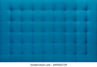 Pattern Of A Blue Cloth Upholstered Headboard