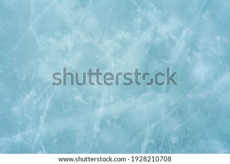 pattern of blue ice with cracks
