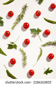 Pattern of cherry tomatoes on a white background