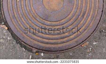 Pattern circles on the metal  manhole cover