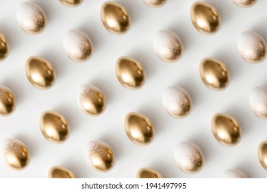 Pattern composition of golden eggs on a white background. Minimal easter concept. - Powered by Shutterstock - Get 15% off with code: PIKWIZARD15
