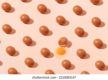 Pattern Composition Made Of Fresh Raw Eggs On Light Background. Egg Shell Broken. Easter Minimal Concept Idea. Top View. Flat Lay.