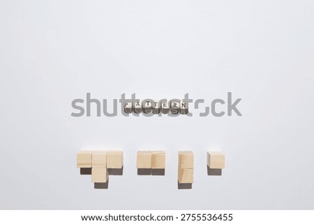 Pattern concept symbolizing repetition, structure, and analytical thinking using wooden blocks and letter tiles.