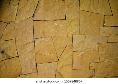 Pattern Of Decorative Brown Stone Wall Texture Absract Background.