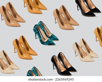 Pattern of elegant lady shoes set in isometry. Modern high heels woman shoes on grey background. Contemporary fashion concept.