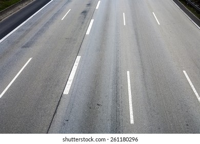 Pattern Of Empty Highway In Grea With Median Stripes