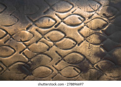 Pattern Of Fish Engraved On A Copper Plate.