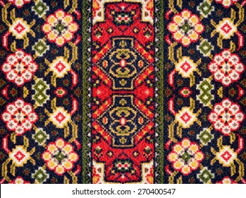  	 A pattern of floral and geometric elements for carpet, bedding