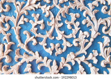Pattern of flower stucco blue background