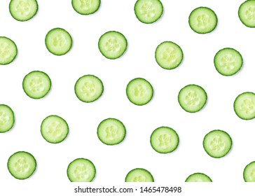 Pattern of fresh cucumber slices isolated on white background. Top view