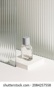 Pattern glass product backdrop with perfume bottle
