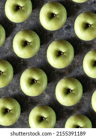 Pattern Of Green Apples On Black Concrete Background. Granny Smith. Fresh Fruits Background.