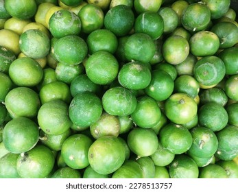 pattern of green lemon in the market.  - Shutterstock ID 2278513757