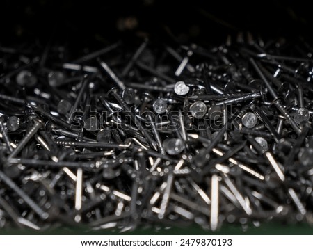 pattern of loose nails and screws