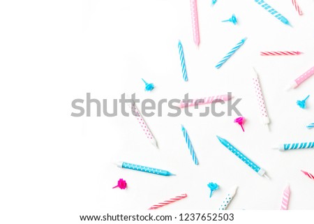 Pattern made of birthday party pink and blue candles. Holiday concept