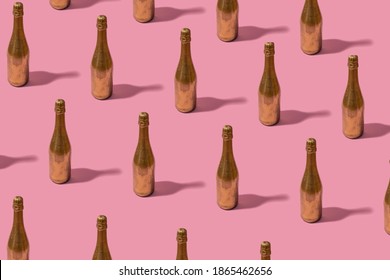 Pattern made of champagne bottle painted in gold color - Shutterstock ID 1865462656
