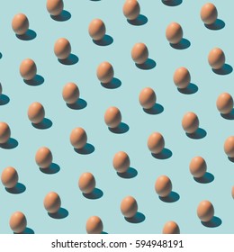 Pattern Made Of Eggs On Pastel Blue Background. Minimal Food Concept.