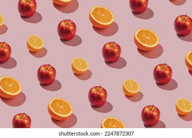 Pattern made of fresh apples, lemons and oranges. Minimal citrus fruits concept.