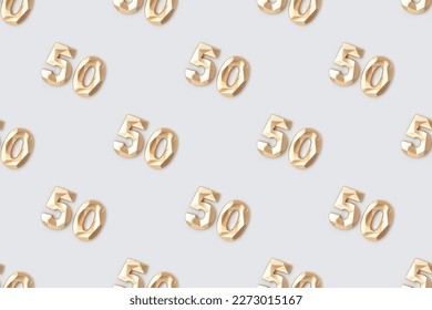 Pattern made of gold colored number fifty on a blue background. 