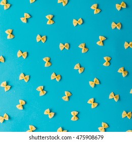 Pattern Made Of Pasta On Blue Background. Flat Lay.