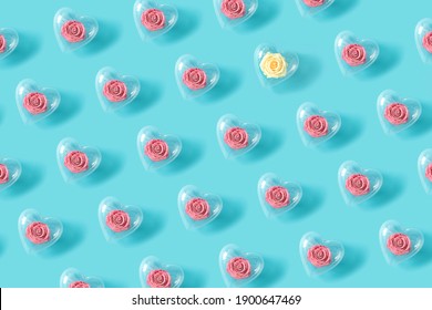 Pattern made of roses in transparent heart shape balloon. Flower wallpaper layout. Minimal flat lay background concept.