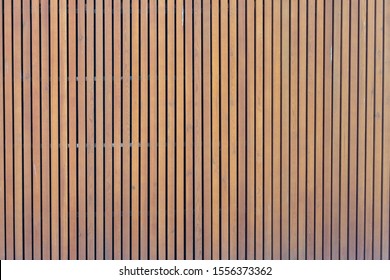 Pattern Of Modern Wall With Vertical Wooden Panel, Slats. Background Of Wooden Boards. Wooden Fence Texture. Wood Plank With Pattern For Design And Architecture