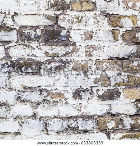 pattern of an old brick wall of a abandoned factory building