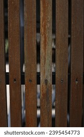 the pattern of old brown wooden fence - Shutterstock ID 2395454773