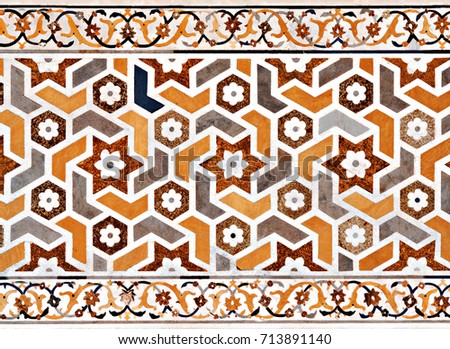 Pattern on Taj Mahal in Agra, India. Taj Mahal is widely recognized as the jewel of Muslim art and one of the universally masterpieces of the world.