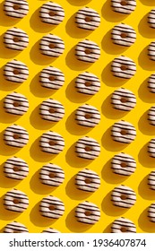 a pattern on a yellow background of donuts