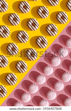 a pattern on a yellow background of donuts