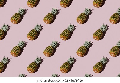Pattern of pineapple on purple background
