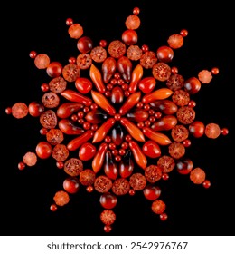 Pattern of red cherry tomatoes on a black background in the shape of a square.