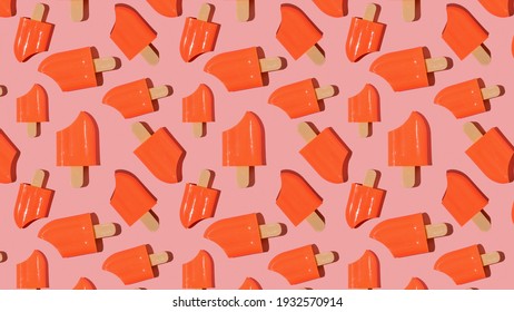 A pattern of red nibbled popsicle on a red background. A popular summer snack.