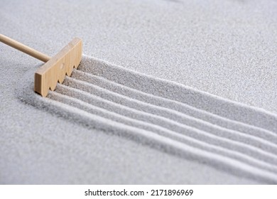 Pattern In The Sand Made With A Mini Zen Garden Tool, A Rake