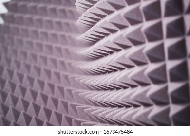 The pattern of the soundproof panel of polyurethane foam. black geometric background