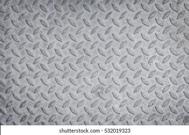 pattern style of steel floor for background . Seamless steel diamond plate texture