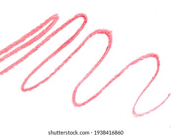 Pattern with wavy lines of red lipstick on a white background, the concept of beauty and makeup.