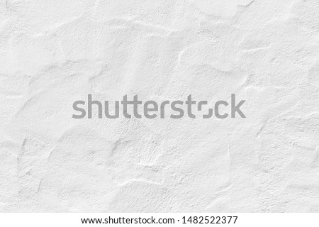 pattern of white plaster wall in rough structure