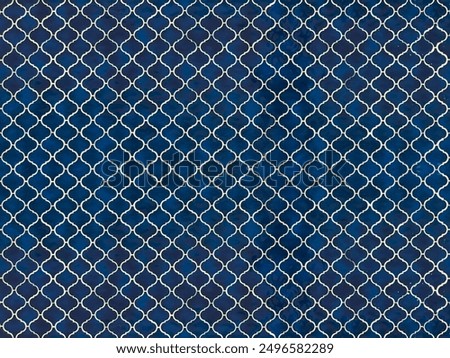Patterned background with repeating geometric design, rich blue with light white. Symmetrical shapes with intricate lattice or arabesque motifs. Traditional Eastern and Islamic architecture and decor.
