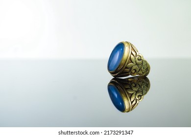 A Patterned Brass Ring Decorated With Lavender Agate